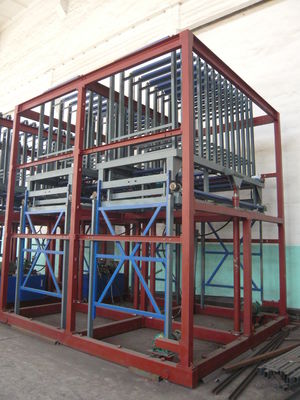 Mikrokomputerowy system sterowania lekką maszyną do formowania paneli ściennych do płyt formierskich